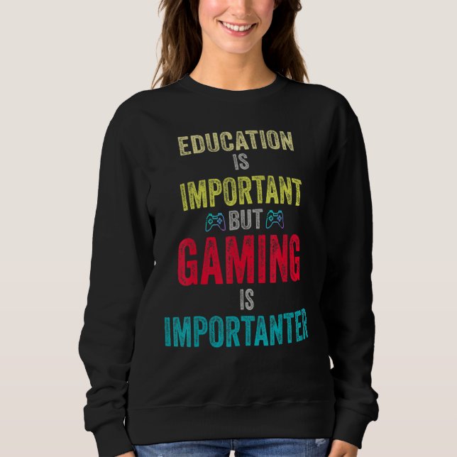 Sweatshirt L'Éducation Est Importante, Mais Le Jeu Est Import (Devant)