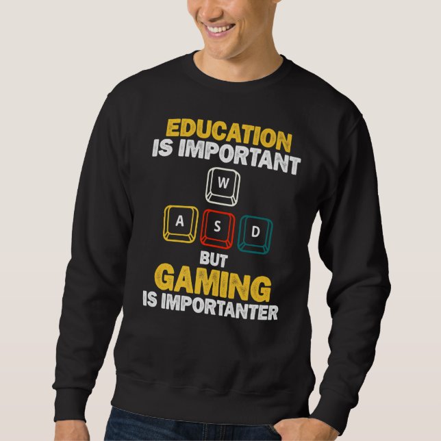 Sweatshirt L'Éducation Est Importante, Mais Le Jeu Est Import (Devant)