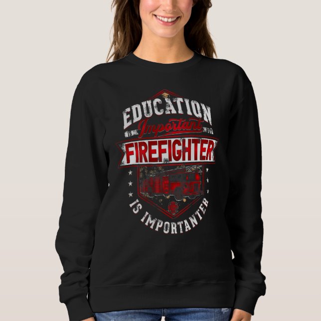 Sweatshirt L'Éducation Est Importante, Mais Le Pompier Est Im (Devant)