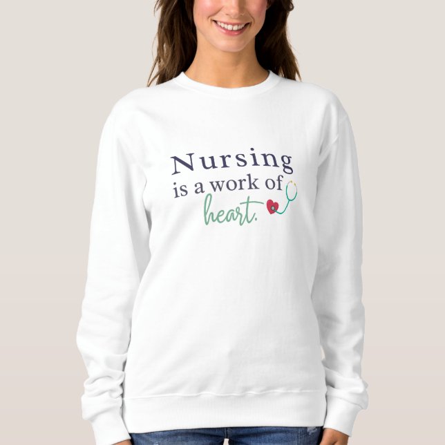 Sweatshirt L'infirmière est une œuvre du cœur Art du stéthosc (Devant)