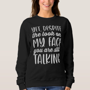 Sweatshirt Malgré le regard sur mon visage, tu parles toujour
