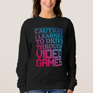 Sweatshirt Mise en garde J'ai appris à conduire grâce aux jeu