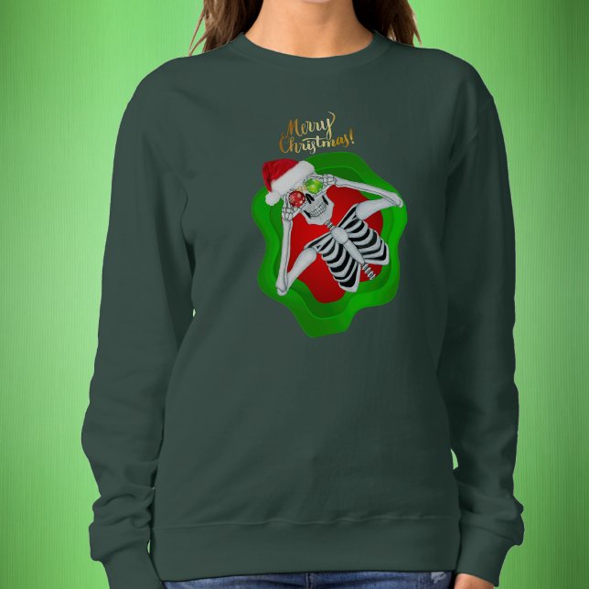 Sweatshirt Noël Squelette Rouge Chapeau de Noël Ornements Ver (Fun Merry Christmas skeleton Santa Hat in green and red splatter shape on sweatshirt.)