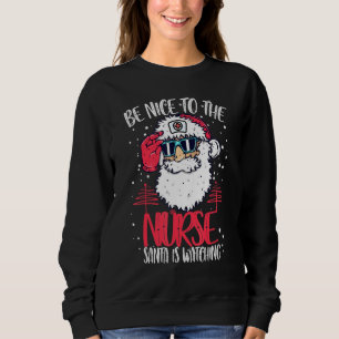 Sweatshirt Soyez Gentil Avec L'Infirmière Père Noël Regarde L