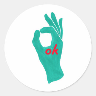 symbole de la main ok dans les autocollants vert a
