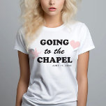 T-shirt Aller à la chapelle | Mariée à thème des années 70<br><div class="desc">Ce t-shirt de mariée "allant à la chapelle" comporte une police rétro des années 70 avec un coeur et des images d'icônes de colombe mariage. Cette chemise fait le cadeau parfait pour une future mariée à sa douche nuptiale ou à son week-end de bachelorette afin qu'elle puisse la porter le...</div>