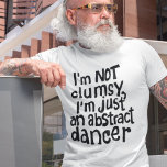 T-shirt Amusant pas maladroit Danseur Abstrait<br><div class="desc">Vous cherchez un tee-shirt unique et amusant qui saisit parfaitement votre personnalité? Ne cherchez pas plus loin que cette chemise avec des lettres originales en noir avec l'amusante phrase intelligente "Je ne suis pas maladroite, je ne suis qu'une danseuse abstraite", cette impression est sûre d'ajouter une touche d'humour et de...</div>