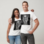 T-shirt Androïde métal argenté<br><div class="desc">Exprime ton style avec ce t-shirt au visage robotique chromé, ultra détaillé et placé sur un fond noir éclaboussé de lumière. L’androïde argenté au regard bleu semble tout droit sorti d’un film de science-fiction futuriste. Un design parfait pour les passionnés de robots, d’intelligence artificielle et de technologie avancée. Ce visuel...</div>