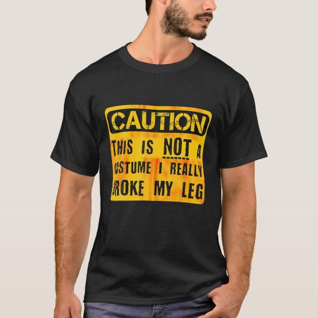 T-shirt Attention Ce N'Est Pas Un Costume Broken Leg Hallo (Devant)