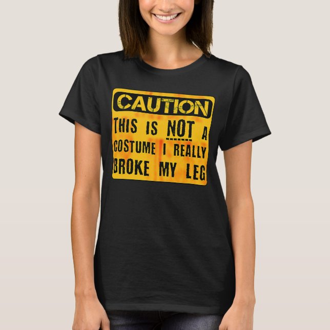 T-shirt Attention Ce N'Est Pas Un Costume Broken Leg Hallo (Devant)