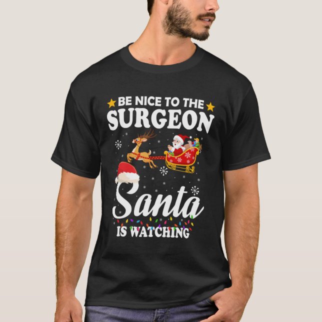 T-shirt Be Nice To The Surgeon Santa Watching Xmas (Devant)