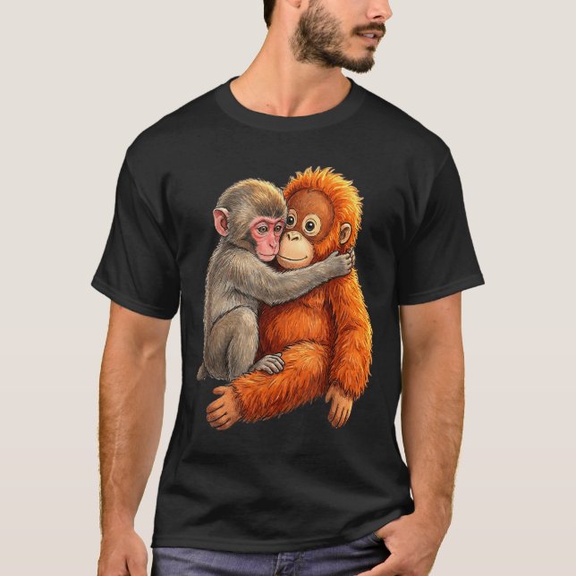 T-shirt Bébé macaque serrant un mignon singe en peluche (Devant)