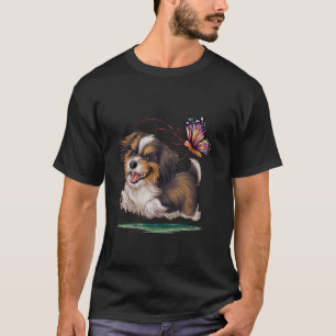 T-shirt Bichon havanais avec papillon coloré.