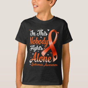 T-shirt Cette Famille Personne ne combat seul la sensibili