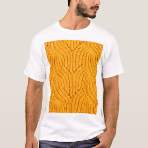 T-shirt Chandail en tricot orange, arrière - plan texturé.