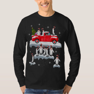T-shirt Chariot rouge de Penguins Camion Santa Hat Penguin