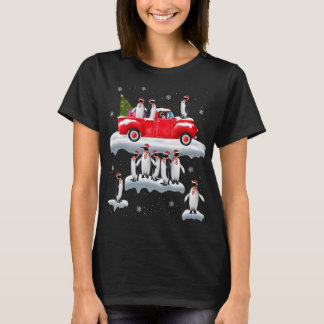 T-shirt Chariot rouge de Penguins Camion Santa Hat Penguin