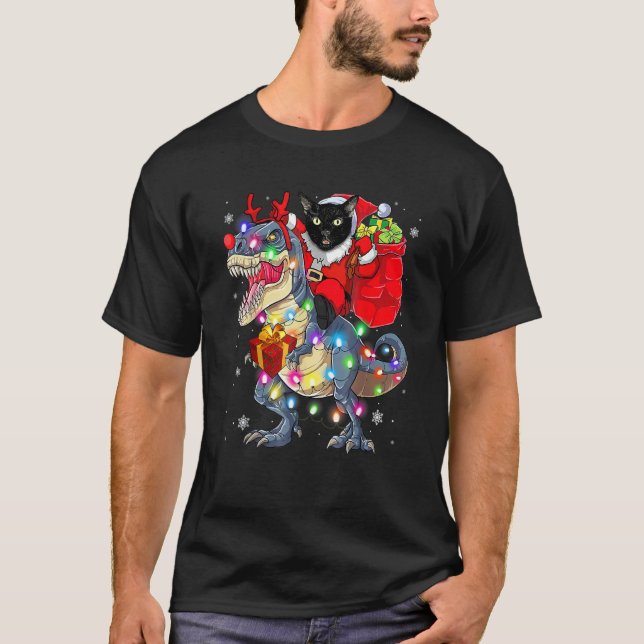 T-shirt Chat à cheval sur un dinosaure Rex Noël (Devant)