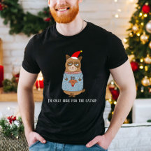 Chat sarcastique portant un hideux pull de Noël