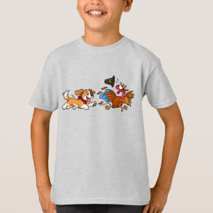 T-shirt Chien drôle poursuivant la dinde de Thanksgiving U