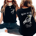 T-shirt Circuler Ou Mourir Jusqu'À La Mort Faisons-Nous La<br><div class="desc">Ajoutez une touche de gothique à votre soirée bachelorette avec notre chemise personnalisée "Ride or Die", parfaite pour un thème "Til Death Do We Party". Ces chemises sont conçues pour associer élégance foncée et plaisir ludique, avec un squelette frappant graphique de mariée et le slogan "jusqu'à la mort faisons-nous la...</div>