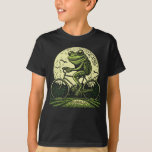 T-shirt Cottage Frog Riding<br><div class="desc">Cottage Frog Riding Bicycle T-Shirt Show your love for bike riding frogs in cottage Style with this frog bike rider Cottage Frog Riding Bicycle . Suitable to any cottagcore cotfit for women,  men and kids.</div>