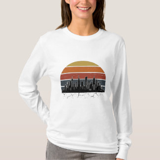 T-shirt Coucher de soleil sur la skyline de la ville rétro