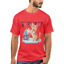 Cute Christmas Kitten Playing with Ornament