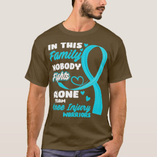 T-shirt Dans Cette Famille Personne ne combat seul Équipe