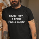 T-shirt David Utilisait un rocher J'utilise un glock<br><div class="desc">Cette conception peut être personnalisée dans la zone fournie en modifiant la photo et/ou le texte. Vous pouvez également le customiser en cliquant sur Personnaliser ce Modèle, puis en choisissant l'option cliquer pour customiser et supprimer ou modifier la couleur de l'arrière - plan, ajouter du texte, modifier la couleur ou...</div>