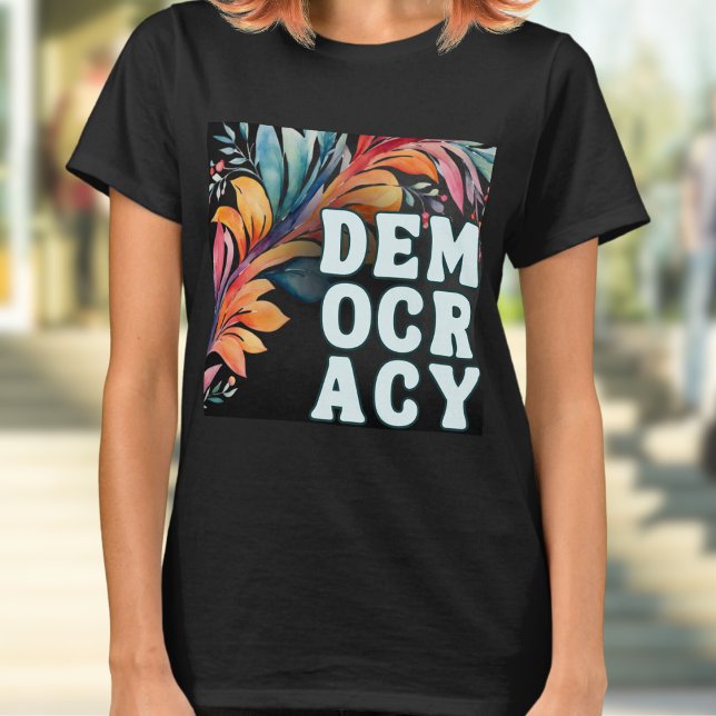 T-shirt Déclaration super Retro Colorée Démocratie (A t-shirt with 'Democracy' in capital letters in a retro groovy style, on a colorful leafy backdrop)