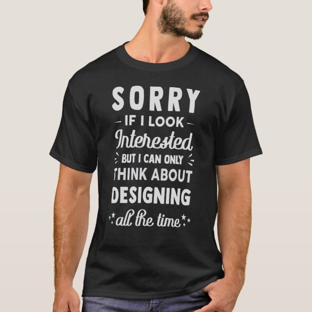 T-shirt Désolée si j'ai l'air intéressée   Pensez à concev (Devant)