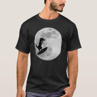 T-shirt Dinosaure sur un panneau de surf en ciel avec le