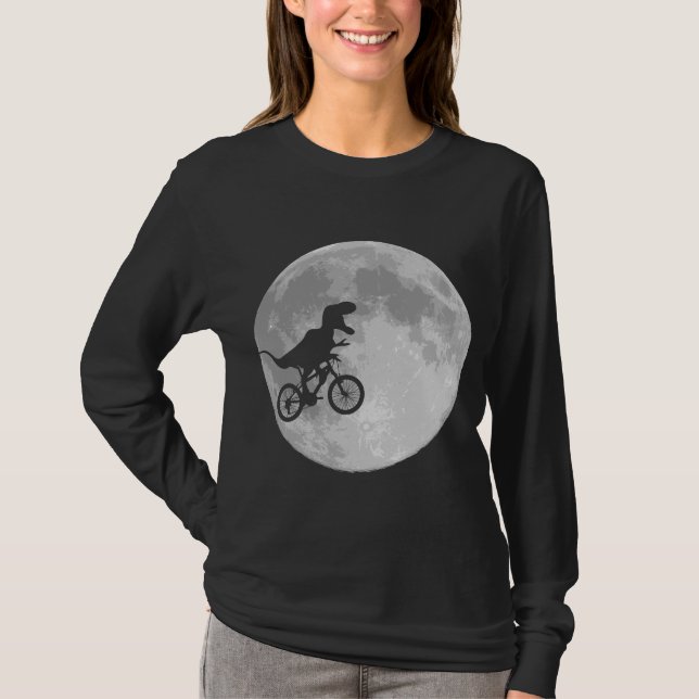 T-shirt Dinosaure sur un vélo dans le ciel avec la lune (Devant)