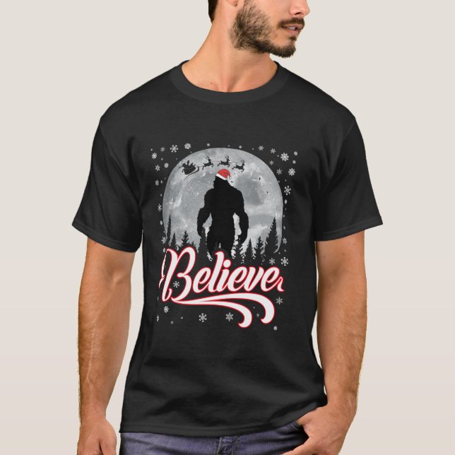 T-shirt Drôle Croire Noël Bigfoot Santa Hat Moon Sce (Devant)