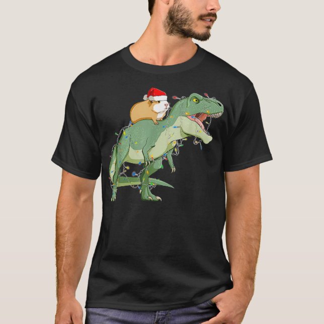 T-shirt Drôle Guinéen équitation Noël Lumière T Rex Dino (Devant)