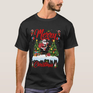 T-shirt Éclairage de Noël Père Noël équitation Doberman Pi