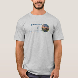 T-shirt Électricité : Une maison en lumière dans un vaste 