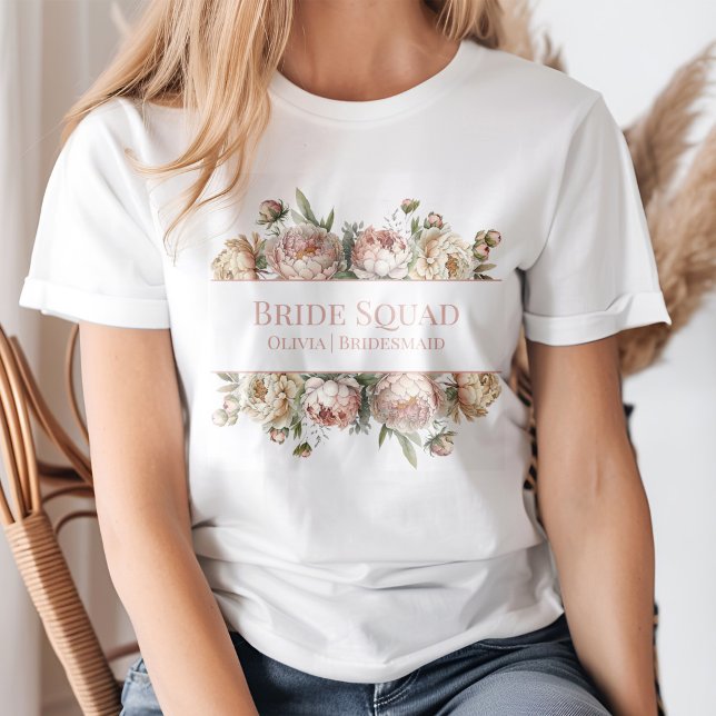 T-shirt Elégant Blush Dusty Rose Peonies Bridal Squad (A young blond woman wearing an Elegant Blush Dusty Rose Peonies Bridal Squad T-Shirt.)