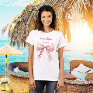 T-shirt Elle attache le noeud rose arc Team Bride