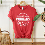 T-shirt En Tri-matière Équipe de football personnalisée avec le nom du jo<br><div class="desc">T-shirt de football avant et arrière personnalisés - illustré en rouge Design dispose d'un logo rond élégant avec casque de football, étoiles et rayures. Personnalisez avec le nom de l'équipe de football de votre joueur, le numéro de maillot et le nom de famille. Comprend un accent de football sur le...</div>