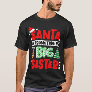 T-shirt Enfants Père Noël me promet Noël aux grandes soeur