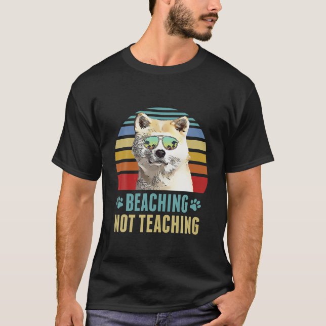 T-shirt Enseignant de chien canadien à la plage (Devant)