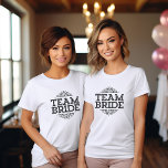 T-shirt Équipe Mariée Bachelorette Soirée de Mariage<br><div class="desc">Le design typographique tendance mignon dit "Team Bride" avec cadre de défilement fantaisie. Un cadeau parfait pour la mariée, la mariée et la fête de mariage à porter tout en se préparant le jour de votre mariage! Utilisez les outils de conception pour personnaliser le design ou choisir un autre t-shirt...</div>
