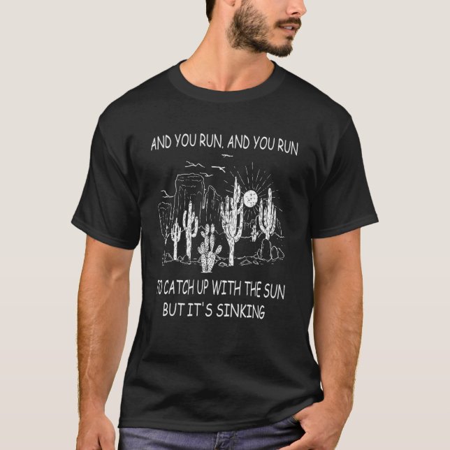 T-shirt Et vous courez pour rattraper le soleil mais c'est (Devant)