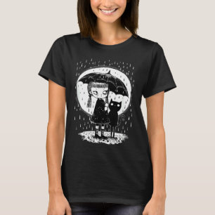 T-shirt Fille debout sous la pluie avec un chat étrange su