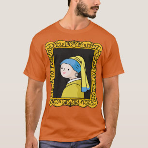 T-shirt fille mal dessinée avec boucle d'oreille perle