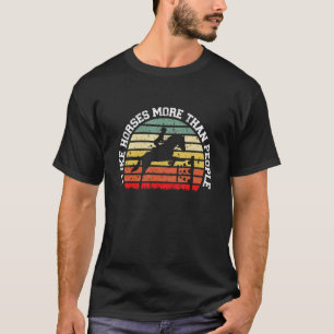 T-shirt Fille qui monte à cheval J'aime les chevaux plus q