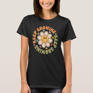 T-shirt Fleur de visage souriant en croissance continue Mo