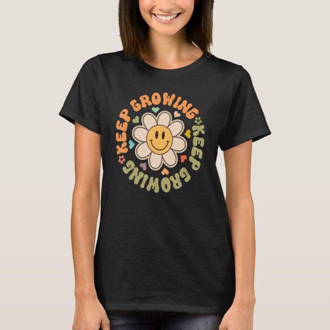 T-shirt Fleur de visage souriant en croissance continue Mo (Devant)
